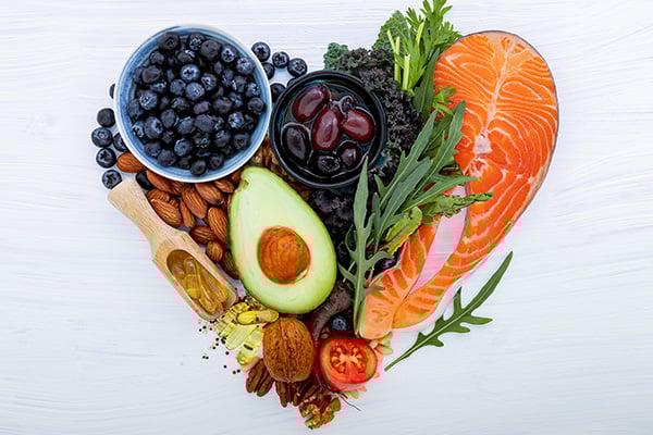 Healthy foods forming a heart symbol