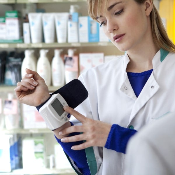 Pharmacist with monitor