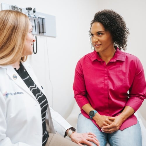 A primary care patient talking with her doctor