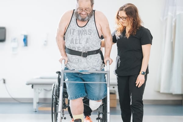 A Rehabilitation patient using a walker