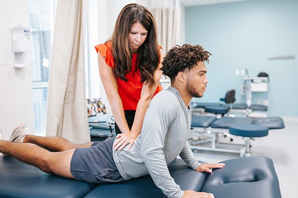 A Rehabilitation patient undergoing back therapy