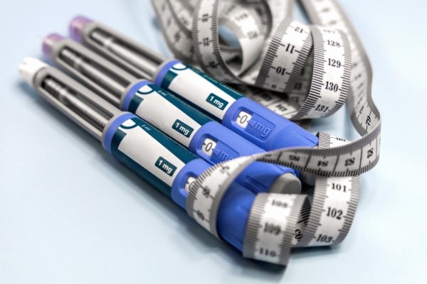 Adjustable medication dispensers and a measuring tape