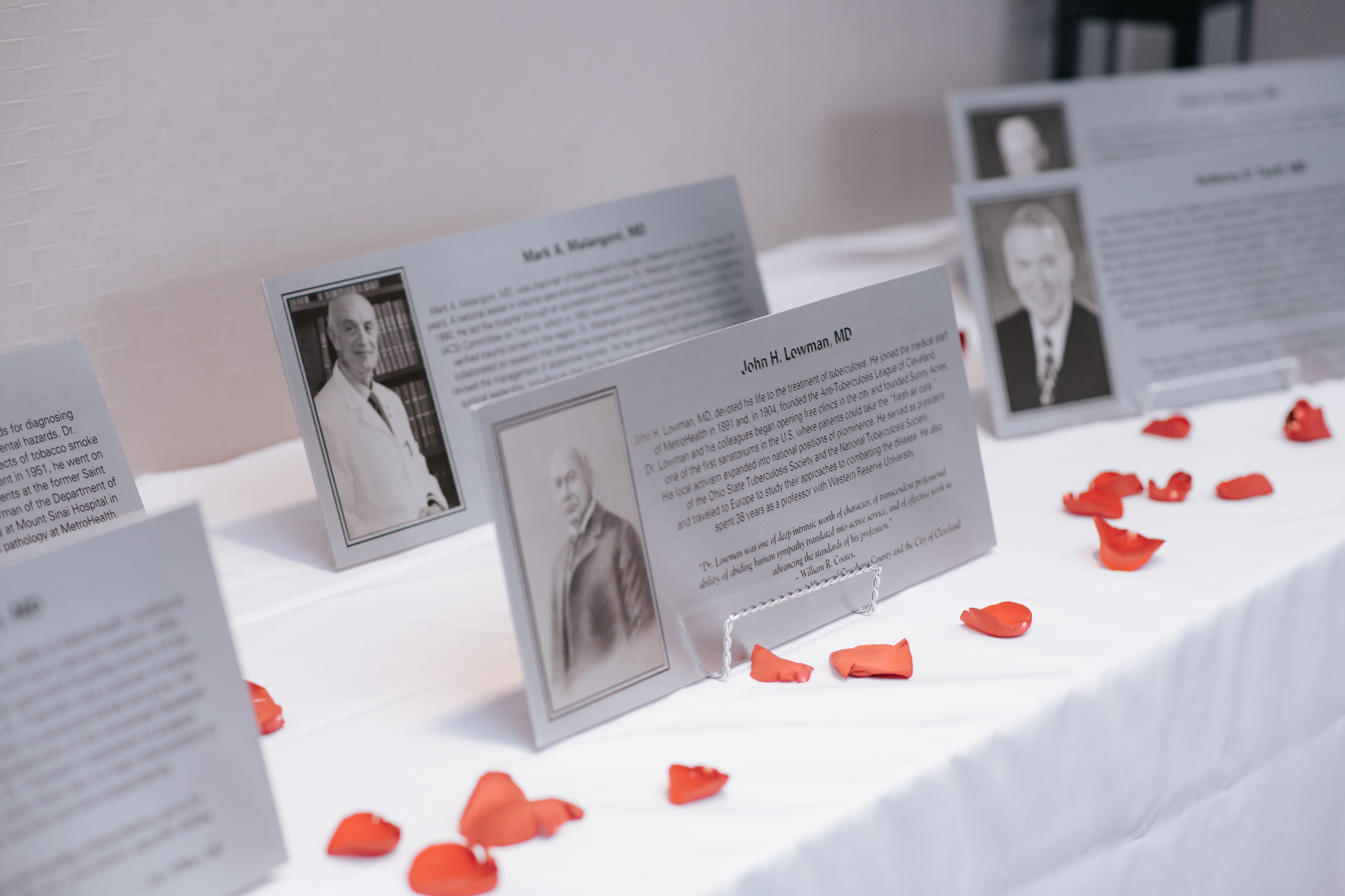 table with Hall of Honor inductees cards on it