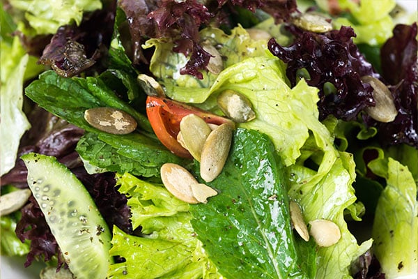 Photo of Greens with Citrus and Pumpkin Seeds salad