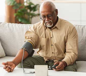 A man testing his blood pressure