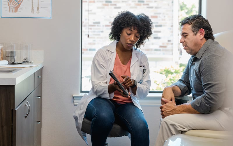 A doctor explaining a treatment plan to a patient