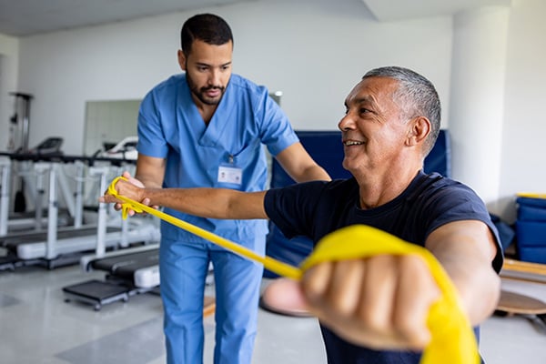 A man doing physical therapy exercises