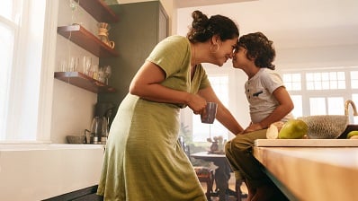 Mother and son in kitchen