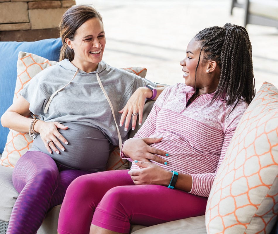 Pregnant woment talking together