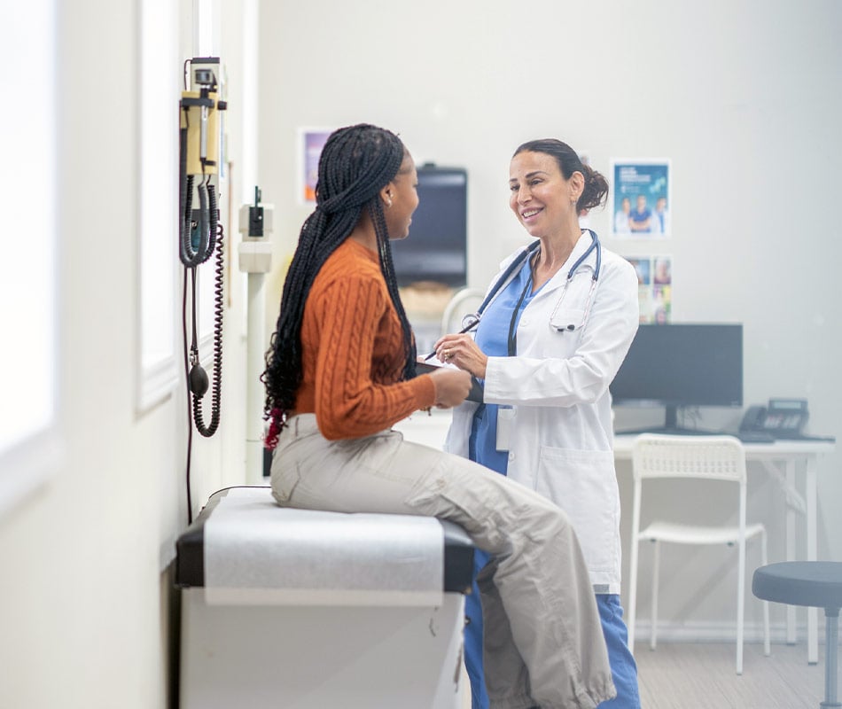 Doctor with female patient
