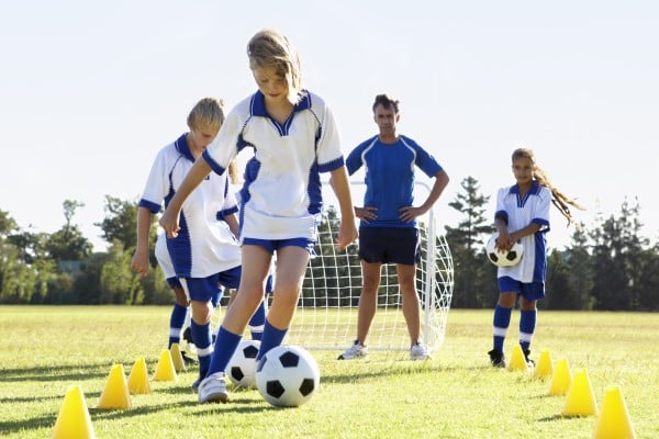 Children playing soccer