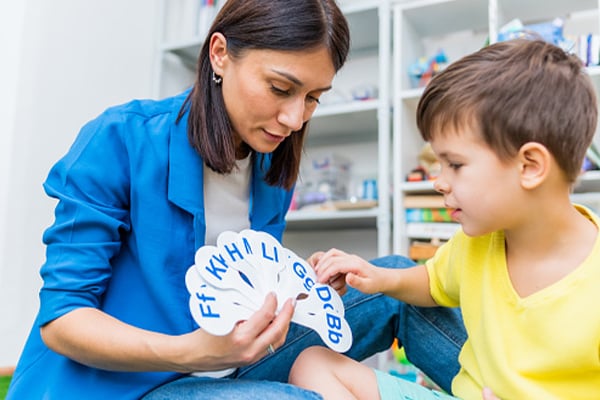 A pediatric Rehabilitation patient practicing a speech exercise
